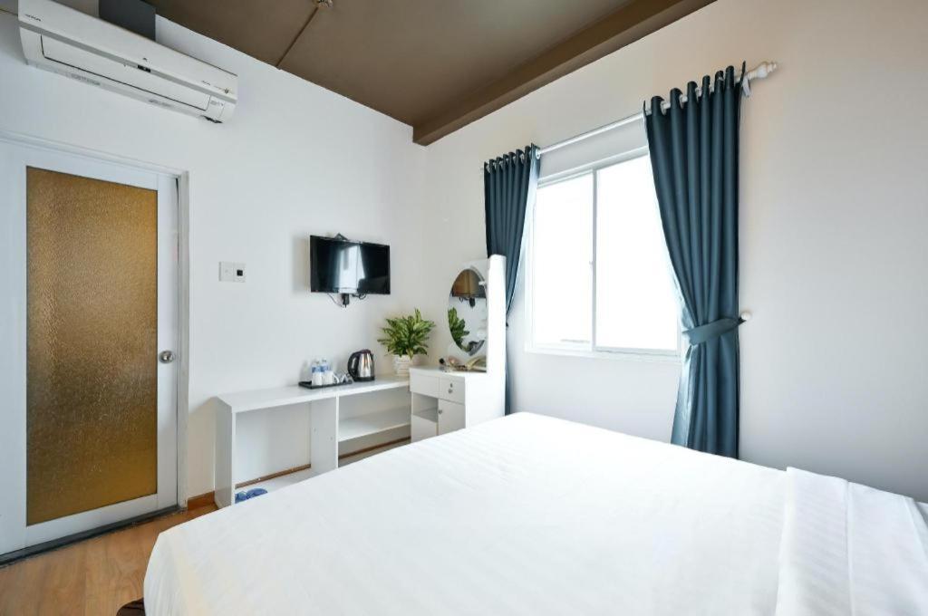 The Noble Swan Wood Park Hotel Ho Şi Min Dış mekan fotoğraf