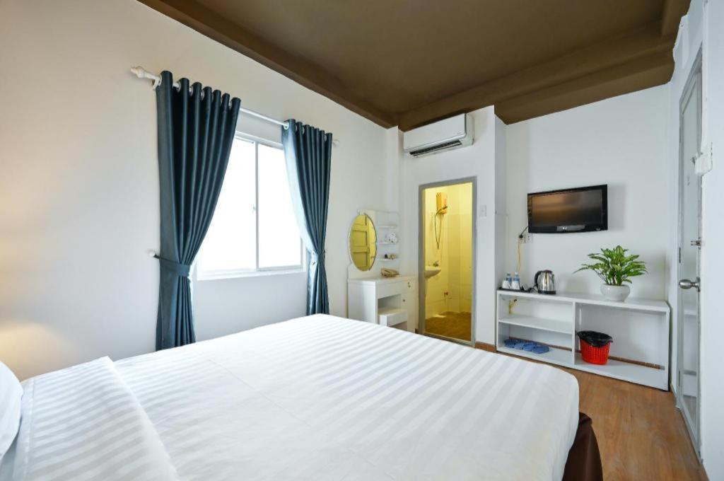 The Noble Swan Wood Park Hotel Ho Şi Min Dış mekan fotoğraf
