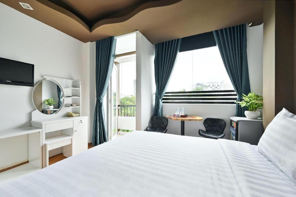 The Noble Swan Wood Park Hotel Ho Şi Min Dış mekan fotoğraf